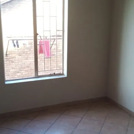 Rent this 2 bed townhouse on Olievenhoutbosch Road in Centurion Golf Estate, Irene