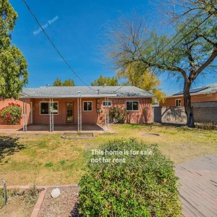 Buy this 3 bed house on 6558 East Cooper Street in Tucson, AZ 85710