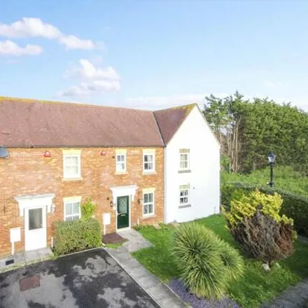 Rent this 3 bed townhouse on Kinleside Way in Angmering, BN16 4FE