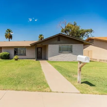 Rent this 4 bed house on 1354 West 12th Street in Tempe, AZ 85281