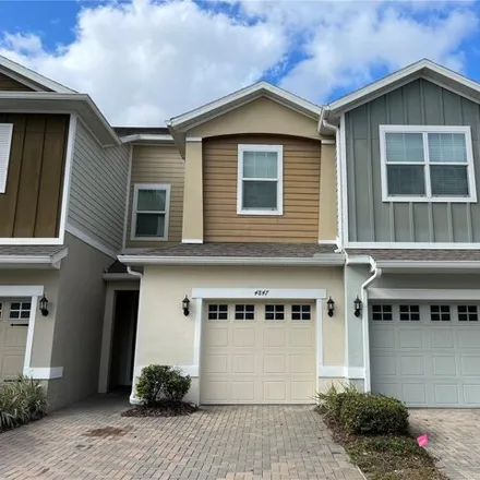 Rent this 3 bed townhouse on 5379 Ronald Reagan Boulevard in Elder Springs, Seminole County
