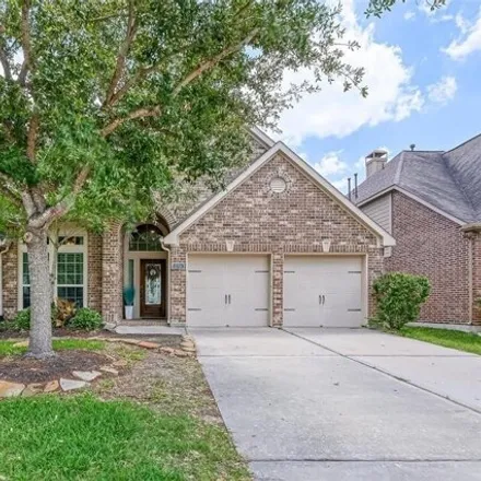 Buy this 4 bed house on 10698 Twilight Creek Lane in Cypress Creek Lakes, TX 77433