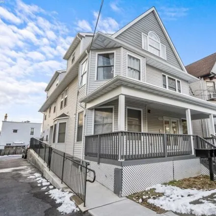 Buy this 9 bed house on 133 Pearsall Avenue in Greenville, Jersey City