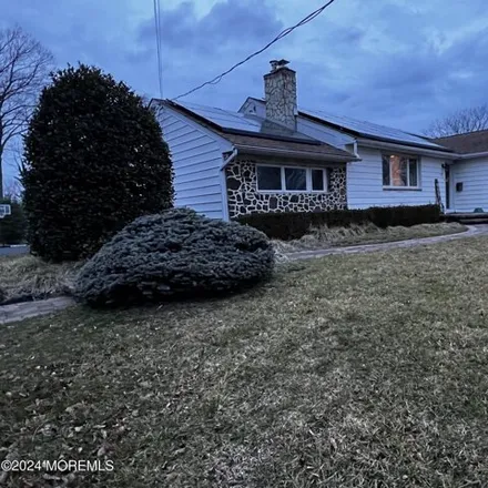 Rent this 3 bed house on 499 W Park Ave in Oakhurst, New Jersey