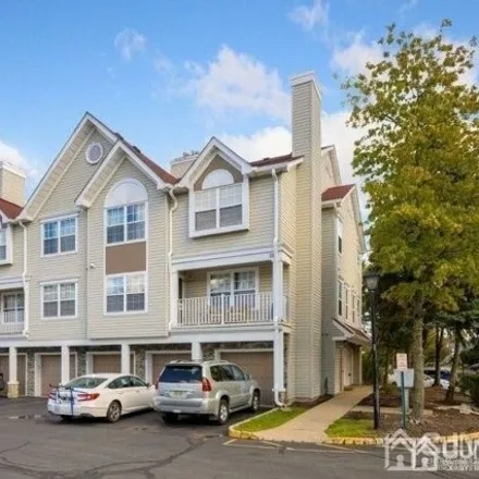 Rent this 2 bed townhouse on 148 Prestwick Way in Edison, New Jersey