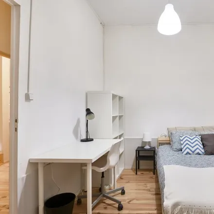 Rent this 8 bed room on Rua Dom Luís I in 1200-225 Lisbon, Portugal