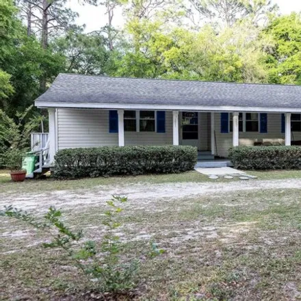 Buy this 4 bed house on 5075 Walnut Grove Lane in Leon County, FL 32305