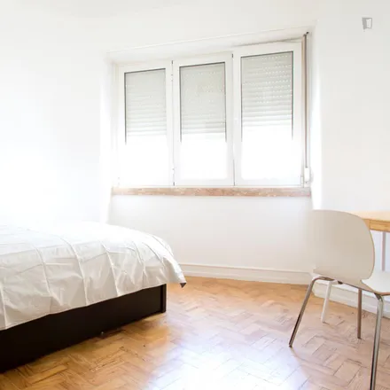 Rent this 4 bed room on Rua do Mato Grosso in 1170-379 Lisbon, Portugal