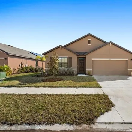 Rent this 4 bed house on 5301 Entertainment Way in Saint Lucie County, FL 34947