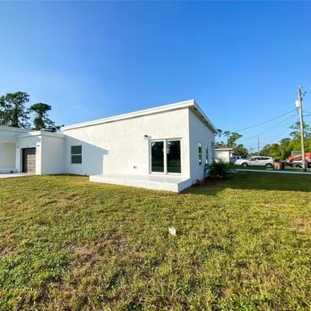 Buy this 6 bed house on 4995 24th Street Southwest in Lehigh Acres, FL 33973