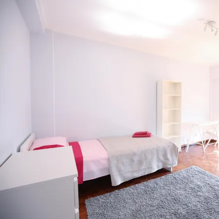 Rent this 4 bed room on Rua da Beneficência in 1600-093 Lisbon, Portugal