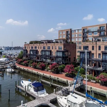 Rent this 3 bed house on The Townhouses at The Crescent in Baltimore Waterfront Promenade, Baltimore