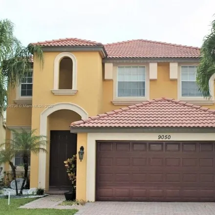Rent this 4 bed house on Dupont Place in Wellington, FL 33447
