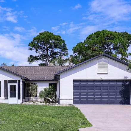 Buy this 3 bed house on 973 Custer Street Northwest in Palm Bay, FL 32907