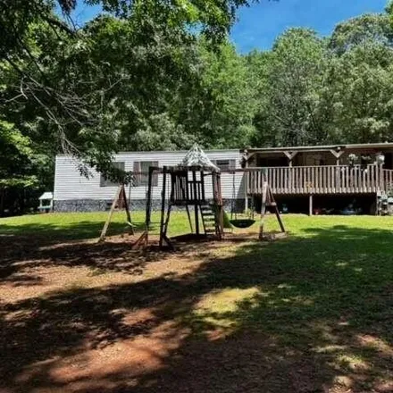 Buy this studio apartment on Still Okelley Road in Madison County, GA