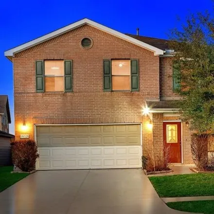 Rent this 4 bed house on 18334 Desert Marigold Drive in Harris County, TX 77073