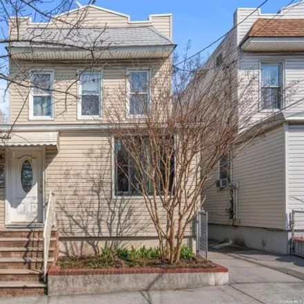 Buy this 6 bed house on 53-35 82nd Street in New York, NY 11373
