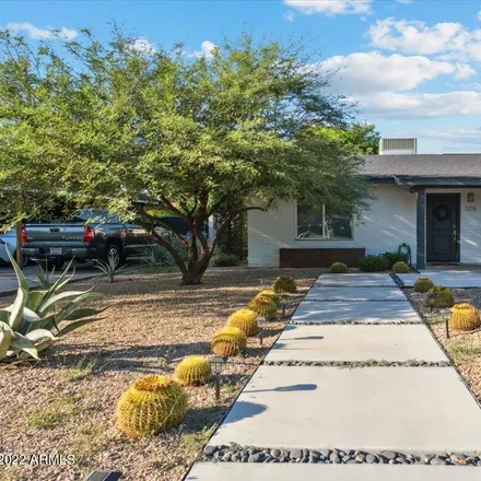 Buy this 4 bed house on 3214 East Clarendon Avenue in Phoenix, AZ 85018