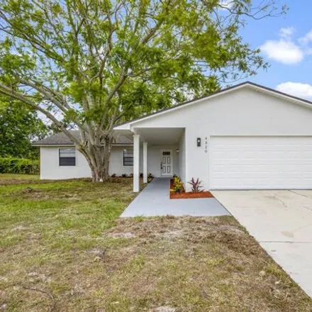 Buy this 4 bed house on 4320 Camberly St in Cocoa, Florida