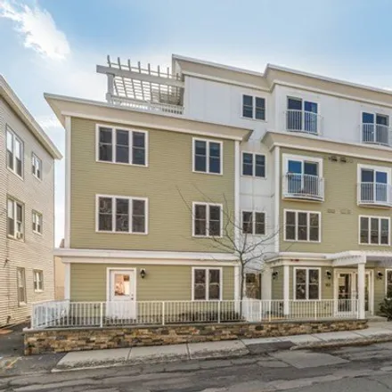 Rent this 2 bed condo on 143 Cedar St Unit 3 in Somerville, Massachusetts