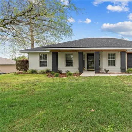 Buy this 3 bed house on 5009 Southwest 104th Loop in Marion County, FL 34476