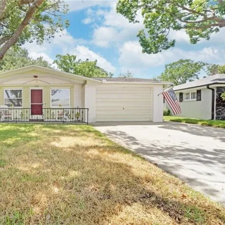 Buy this 2 bed house on 11620 Oceanside Drive in Bayonet Point, FL 34668