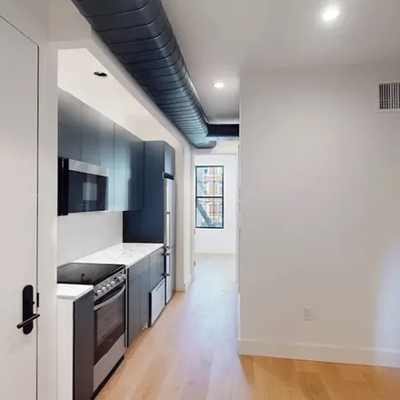 Rent this 2 bed apartment on 86 East 3rd Street in New York, NY 10003