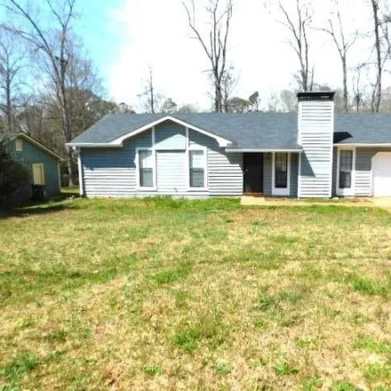 Rent this 3 bed house on 1951 Woodlot Trail in Redan, GA 30058