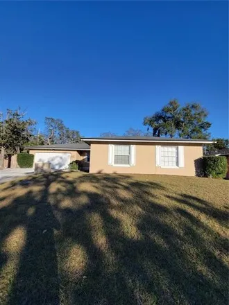 Buy this 4 bed house on 2293 Woodwind Drive in Orange County, FL 32808