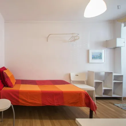 Rent this 6 bed room on Vitorino Nemésio (19 de Dezembro de 2001) in Rua da Sociedade Farmacêutica, 1050-088 Lisbon