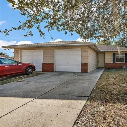 Buy this 2 bed townhouse on 203 Fern Court in Leesburg, FL 34748