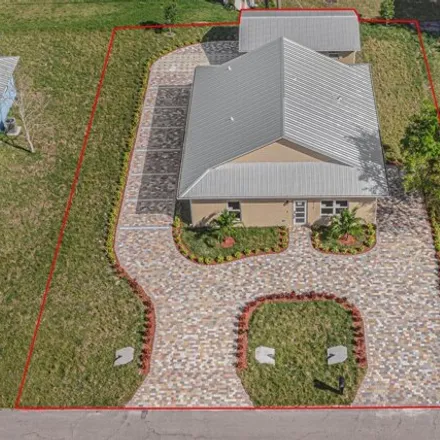 Buy this 4 bed house on 5364 Deleon Avenue in Lakewood Park, FL 34951