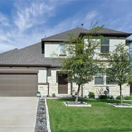 Rent this 4 bed house on 17728 Silent Harbor Loop in Travis County, TX 78660