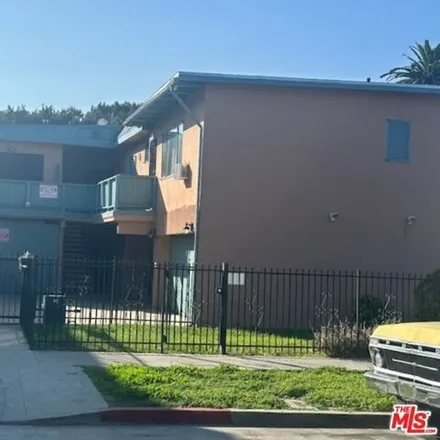 Rent this 3 bed apartment on 2715 South Cloverdale Avenue in Los Angeles, CA 90016