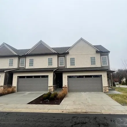 Rent this 3 bed condo on 11327 Iziks Way in Green Oak Charter Township, MI 48116