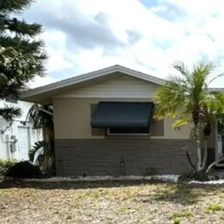 Buy this 3 bed house on 4668 Mayflower Drive in Elfers, FL 34652