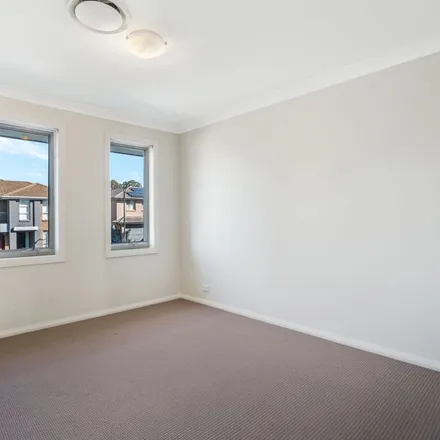 Rent this 3 bed apartment on 62 Hemsworth Avenue in Middleton Grange NSW 2171, Australia
