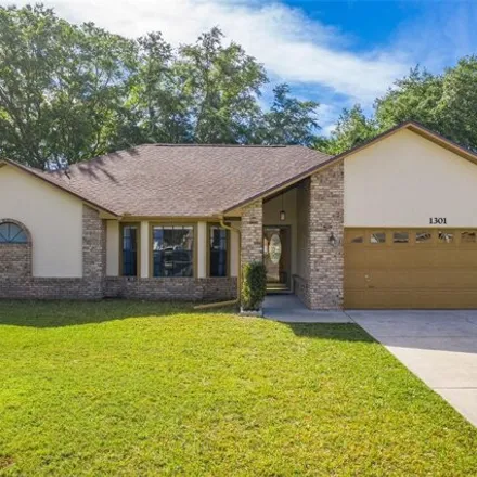 Buy this 4 bed house on Canoe Creek Woods Drive in Saint Cloud, FL 34772