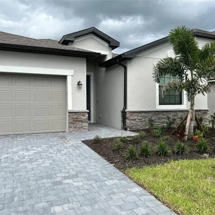 Rent this 4 bed house on Fishawk Trail in North Port, FL