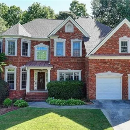 Buy this 7 bed house on 4086 Creekview Ridge Drive in Gwinnett County, GA 30518