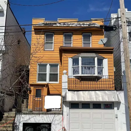 Buy this 3 bed house on 58-57 57th Road in New York, NY 11378