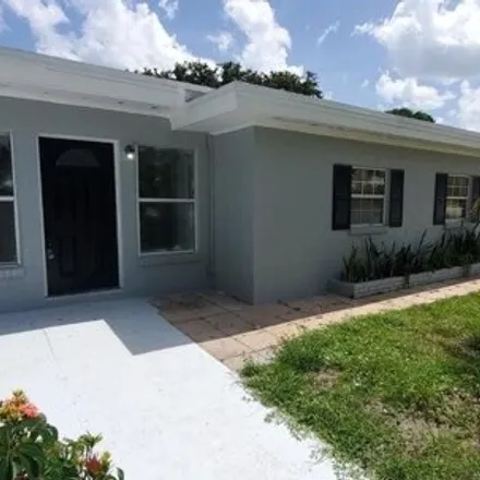 Rent this 2 bed house on 3266 Seneca Avenue in Paradise Park, Saint Lucie County