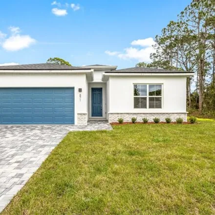 Buy this 4 bed house on 867 Buchanan Avenue Southeast in Palm Bay, FL 32909