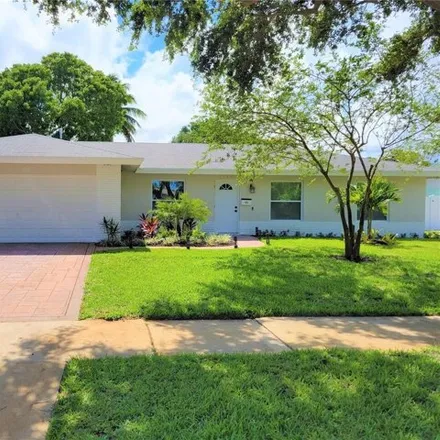 Rent this 4 bed house on 753 Tradewind Drive in North Palm Beach, FL 33408