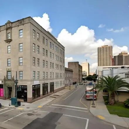 Rent this 2 bed condo on 701 Carondelet Street in New Orleans, LA 70113