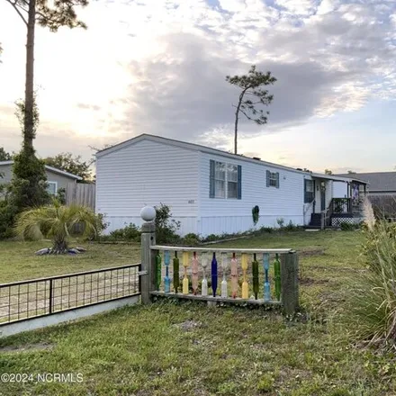 Buy this studio apartment on 4404 Sea Pines Drive Southeast in Brunswick County, NC 28461