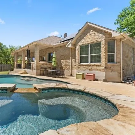 Buy this 4 bed house on 7705 Jaborandi Drive in Austin, TX 78737