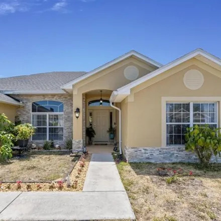 Buy this 4 bed house on 3494 Southwest San Giorgio Street in Port Saint Lucie, FL 34953