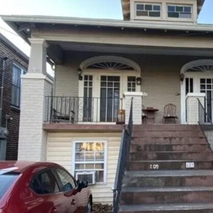 Rent this 2 bed house on 617 North Alexander Street in New Orleans, LA 70119