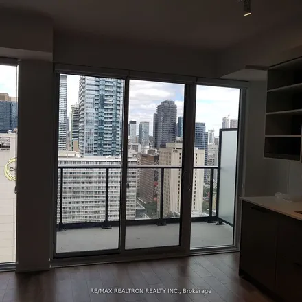 Rent this 2 bed apartment on Panda Condos in Lane W Yonge S Elm, Old Toronto